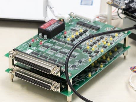 Close-up of a measurement board lined with D-sub connectors